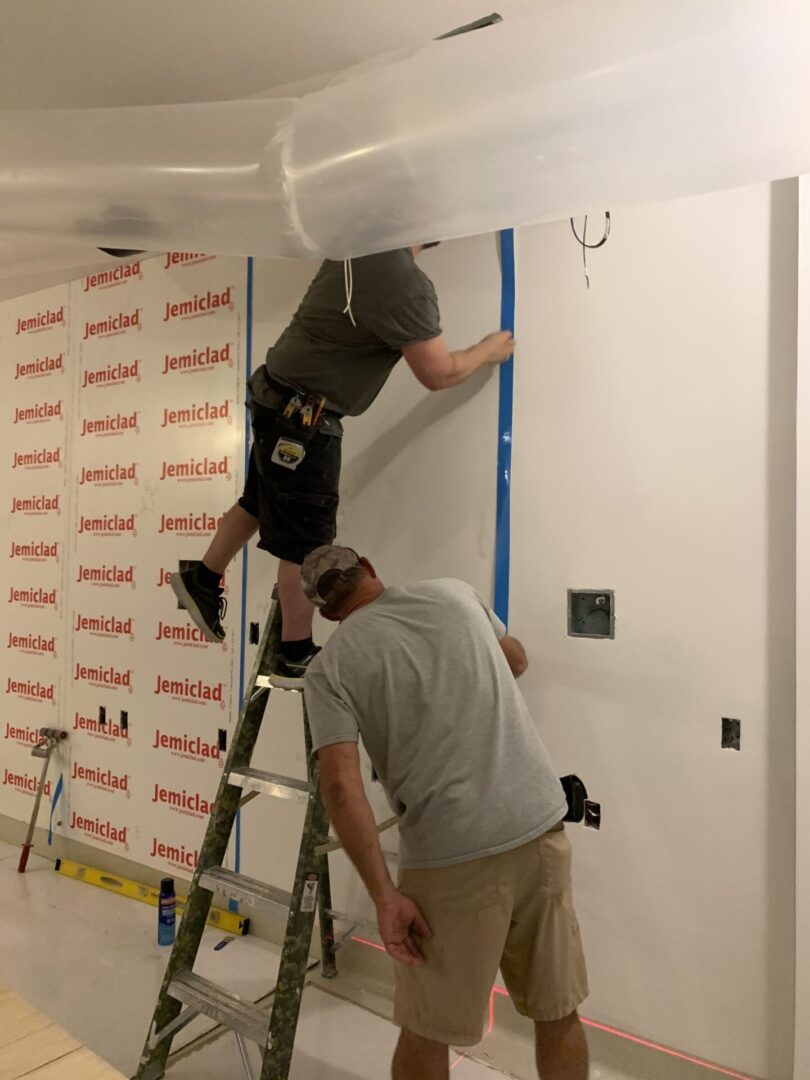 PVC Wall Protective Units Being Installed
